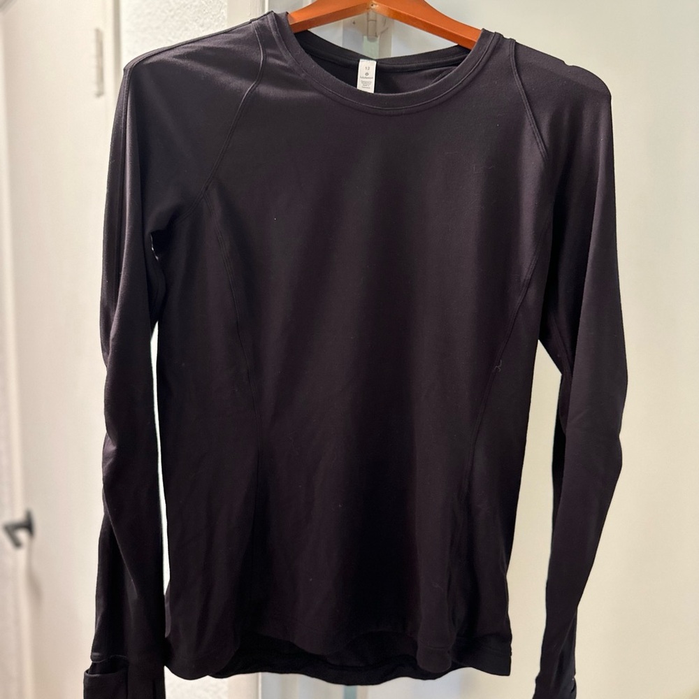 Womens Lululemon Long Sleeve Shirt Size 12. Perfect condition.